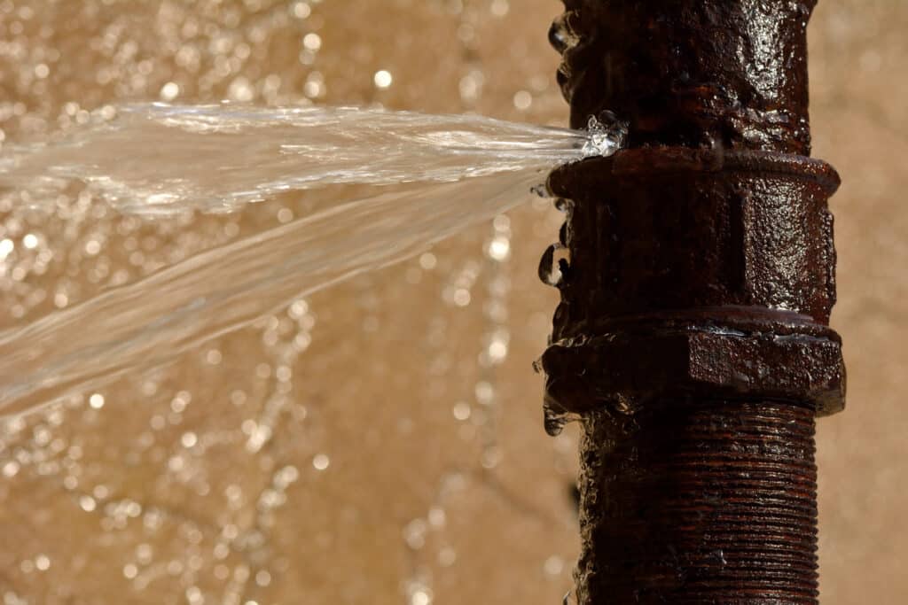 An old pipe breaks in freezing weather